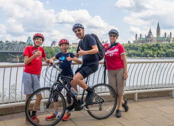 Family is giving thumbs up to their private bike tour in Ottawa with Escape at the Museum of History landmark