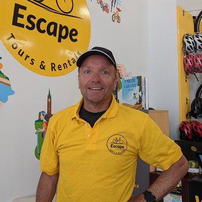 Mike, an experienced, local, fun and knowledgeable tour guides at Escape Bicycle Tours and Rentals lead Ottawa bike tours