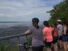 Guests looking at Ottawa River Pathway when biking at Voyageur bike trail on an Escape day bike tour from Ottawa to Aylmer