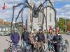 Guests taking picture in front of Spider Maman, Notre-Dame Cathedral Basilica during Escape Ottawa multi-day cycling tour