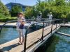 Child and participants are crossing Hartwells lock with their bikes at rideau Canal during their Ottawa tour with Escape