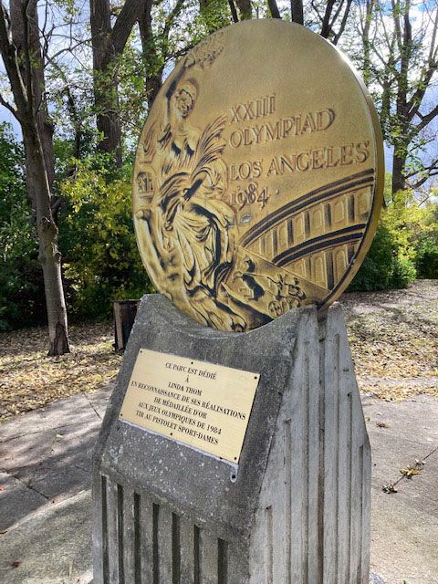 A stop at the Gold Medal monument in Linda Thom Park in Ottawa during the Good Sports Bike Tour with Escape Tours and Rentals