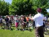 Tour guide is telling youth groups about Ottawa’s history and landmarks during an Ottawa school group bike tour with Escape