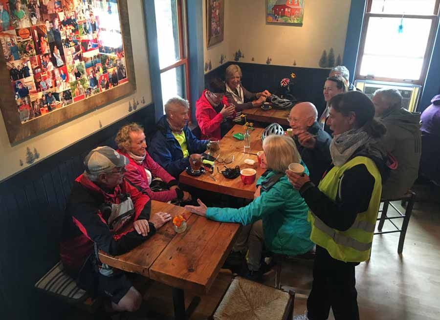 Guests are having lunch at a local cafe during Ottawa multi-day cycling tour by Escape tours rentals on Sparks