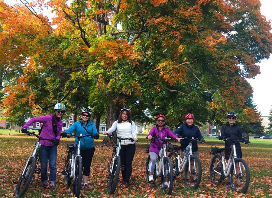 A group of friedns enjoying Private Electric Bike Tour in Ottawa with Escape in Fall