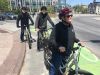 A family has joined Ottawa Electric Bike Tour with Escape in Ottawa and are biking on safe bike paths in Ottawa