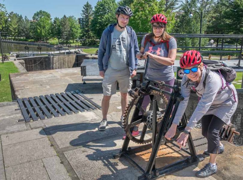 Small group of friends enjoying Escape Ottawa highlights bike tour at Ottawa Landmarks, arboretum and Rideau Canal locks
