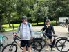 A couple is enjoying private electric bike Tour in Ottawa with Escape. A stop at Rideau Hall in Ottawa