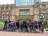 Participants of a corporate group bike and food tour stop at Museum of nature to learn and take picture with Escape