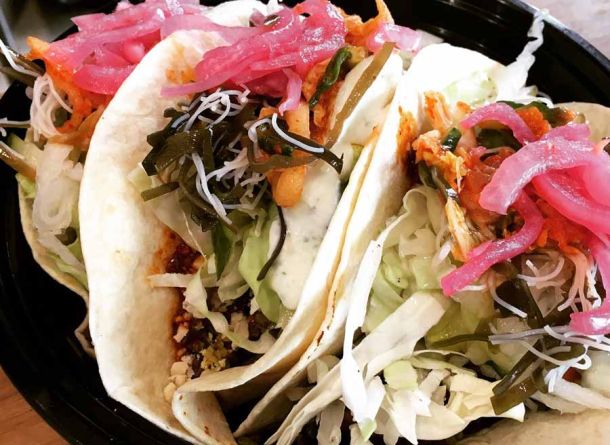 Eat delicious tacos at Old Ottawa East local eatery during bike and food tour of Ottawa with Escape Tours rentals