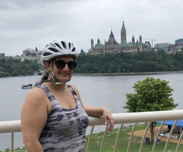 In front of the Ottawa Landmarks: Escape-Bicycle-Tours-Ottawa-Photo-Sabrina-Pirillo