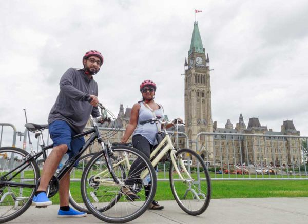 Biking Date on Parliament Hill escape Ottawa bike tour