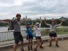 Family is happy at the Museum of History lookout at with a view of Parliament building on an Ottawa express bike tour 