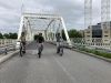 A group is enjoying biking in Ottawa's neighbourhood during Ottawa Electric Bike Tour with Escape.
