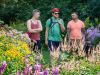 Friends are walking through Fletcher WildLife Garden during Escape garden promenade self-guided bike tour in Ottawa