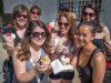 A group of girlfriends having a bachelorette party eating artisan ice cream during Escape bike and food tour in Ottawa