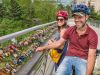 A couple are visiting Love Lock Bridge or Corktown Bridge Landmark at Rideau Canal during Escape Ottawa Express Bike tour with Escape