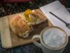 Lunch stop at a local cafe with panini sandwich and Cappuccino during best of Ottawa day tour by bike by Escape on Sparks