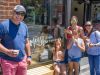 Parents and kids eating artisan Moo Shu ice cream during one of Escape specialty tours called Bike and Food tour in Ottawa