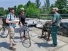 Tour participant chat with Lockmaster at Rideau Canal lock close to experiential farm during best of Ottawa bike tour by escape