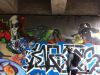A guest is looking at street art mural during during best of Ottawa Neighbourhood and nature bike tour with Escape on Sparks