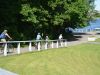 Small-group tour guests are cycling at Ottawa River Pathways on sunny day during Ottawa highlights bike tour by Escape