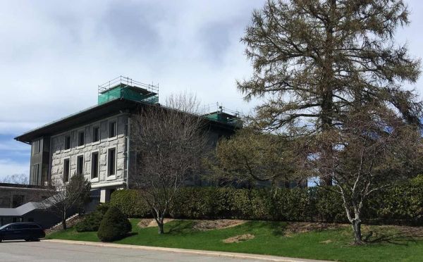 Cyclist exploring Doors Open Ottawa buildings June 2026