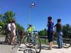 Tour guide showing participants an Ottawa landmark during Ottawa multi-day cycling tour by Escape tours on Sparks