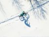 A woman is riding a fat bike in winter in Ottawa