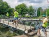 Youth are crossing Hartwells Lock at Rideau Canal during their  school bike tour in Ottawa with Escape tours rentals